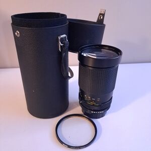 vintage image lens mc zoom F2.8 135mm 1:3.9 camera lens